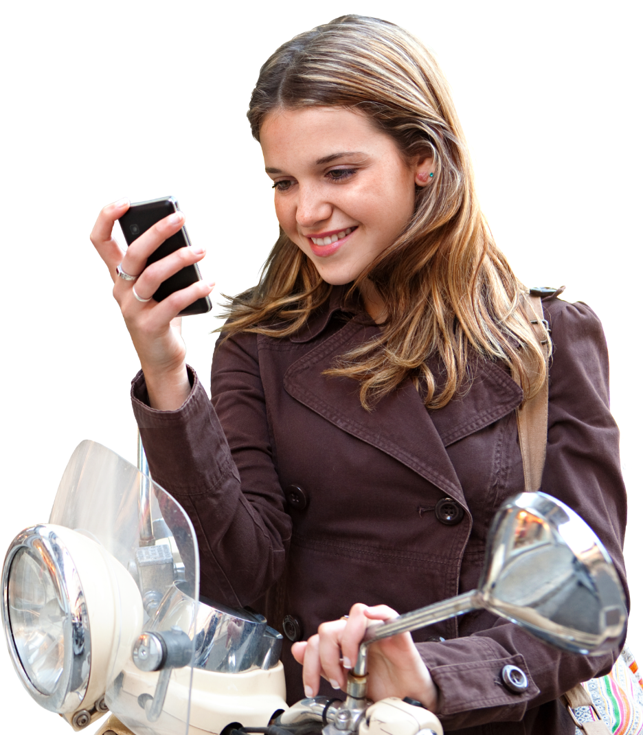 woman holding phone with one hand while on motorcycle